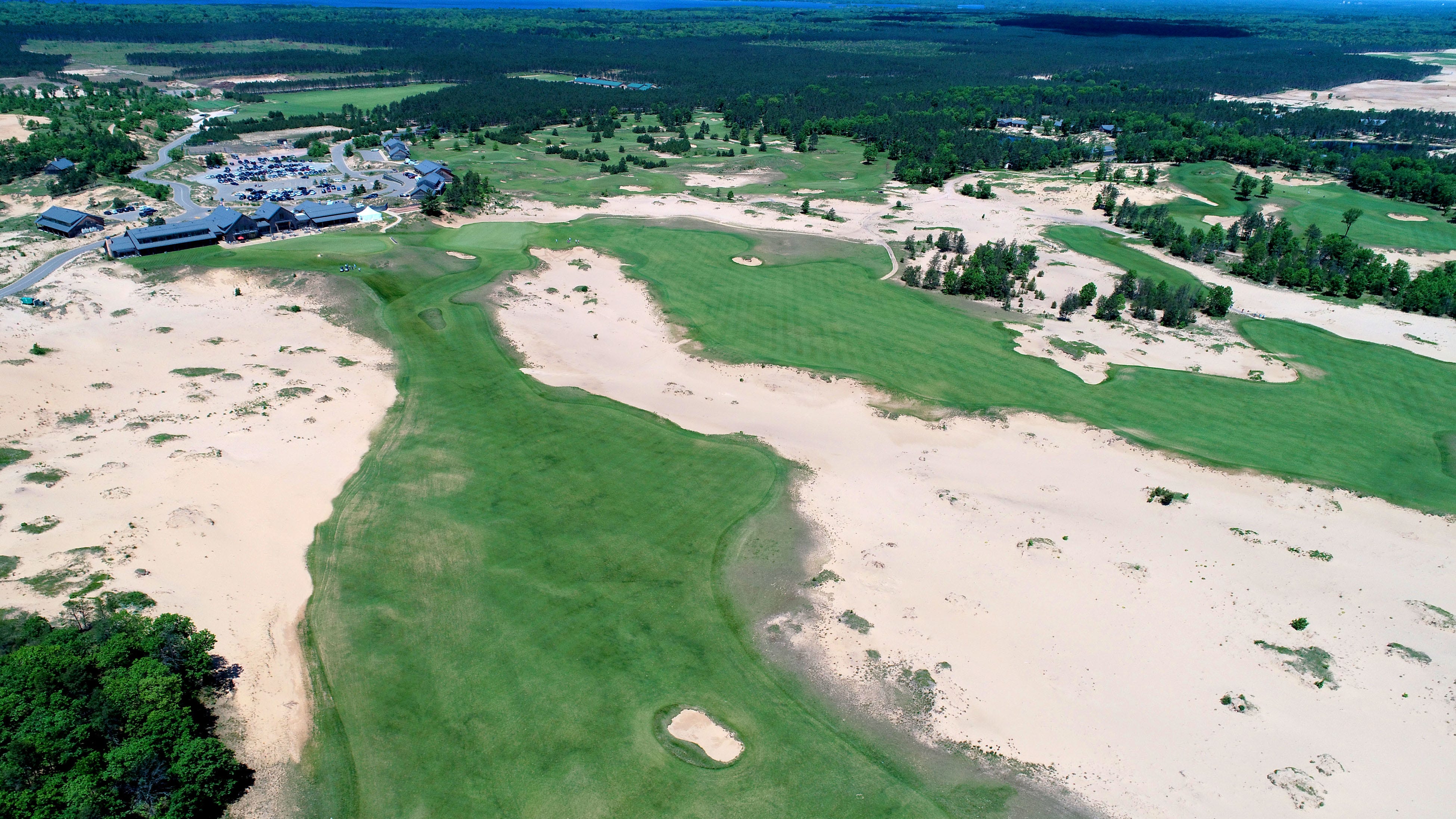 The main clubhouse at Sand Valley Golf Resort in Rome, upper left, and the Mammoth Dunes course.