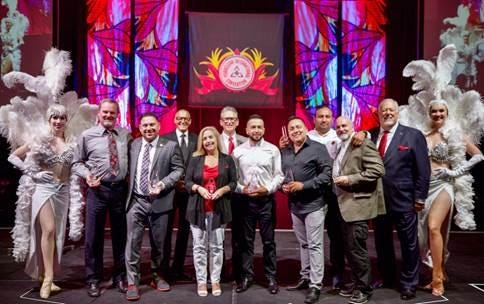 Julia Jones, center, with other award winners at PuroClean's convention in May in Las Vegas.
