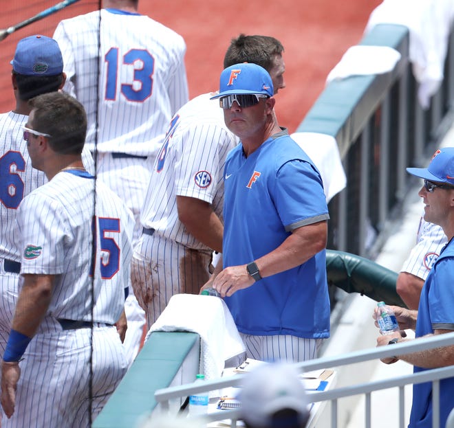 Florida Gators head coach Kevin O'Sullivan in the dugout during the final game of the Gainesville Regionals in the 2022 Division 1 Baseball Championship against the Oklahoma Sooners held at Condron Stadium on the UF campus in Gainesville Fla. June 6, 2022.