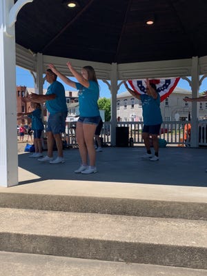 The New Towne Cloggers perform at the Dennison Railroad Festival.