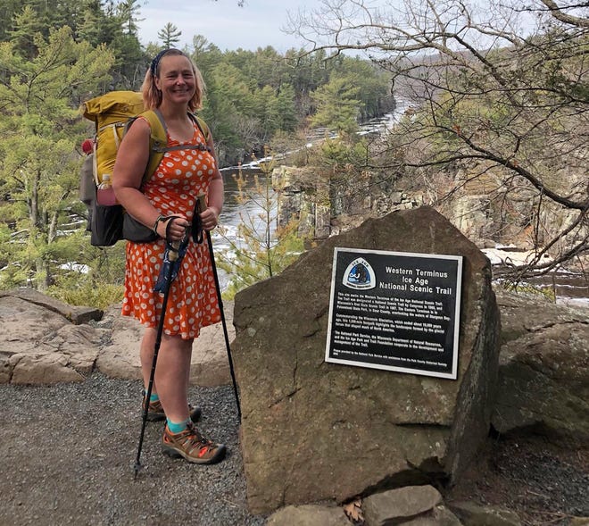 Arlette Laan stands at the western terminus of the Ice Age Trail in Interestate State Park in St. Croix Falls on May 5, 2022. Laan is hoping to hike the entire 1,200-mile Ice Age Trail and become the first woman to hike all of the country's 11 national scenic trails.