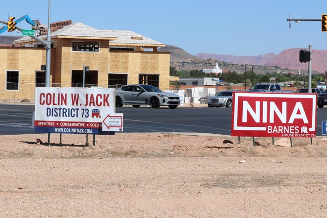 Campaign signs advertising for the two Republican candidates in the House District 73 primary, Colin Jack and Nina Barnes, along River Road in St. George. June 6, 2022.
