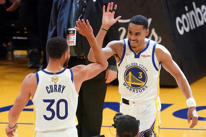 Game 2:  Jordan Poole (3) and Stephen Curry (30) celebrate after the Warriors rolled to the win.
