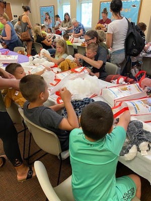 More than 40 youngsters created a new furry friend at the Tallmadge Branch Library's Animal Workshop on June 1.
