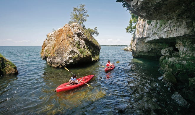 Two kayakers paddle near South Bass Island State Park