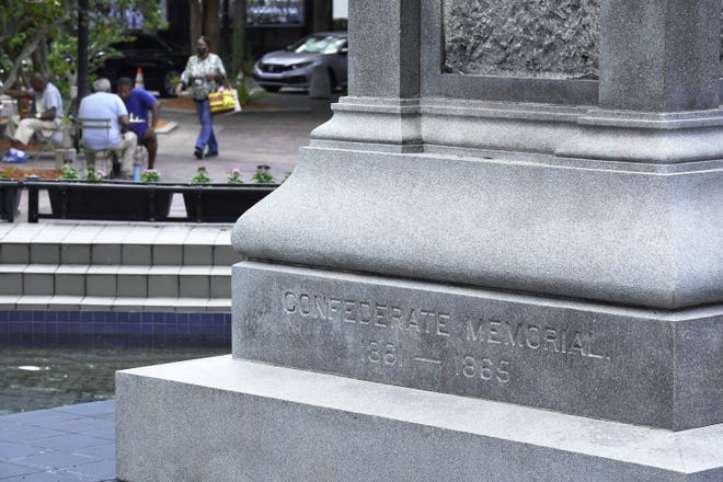 Despite the Confederate soldier being dismantled from atop the fountain statue in renamed James Weldon Johnson Park, the inscription on the east-facing side of the base still displays "Confederate Memorial 1861-1865" across from Jacksonville City Hall.