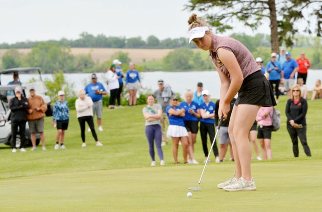 Harrisburg senior Reese Jansa putts on the No. 18 green Tuesday during the final day of the state Class AA girls golf tournament at the Brookings Country Club. Jansa shot an even par 72 and overcame a 5-shot deficit to repeat as the individual champion. She also led Harrisburg to the team title.