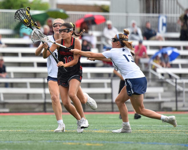 Chatham and Haddonfield girl's lacrosse play in the NJSIAA Tournament of Champions quarterfinals on June 7, 2022. Haddonfield's Stella Stolarick #10 and Chatham's Maddie Engelkraut #13.