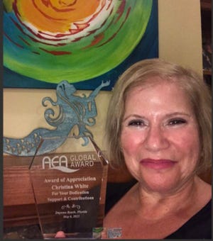 Christina White was recently honored with an award at the International Aquatic Fitness Conference held in May in Florida.