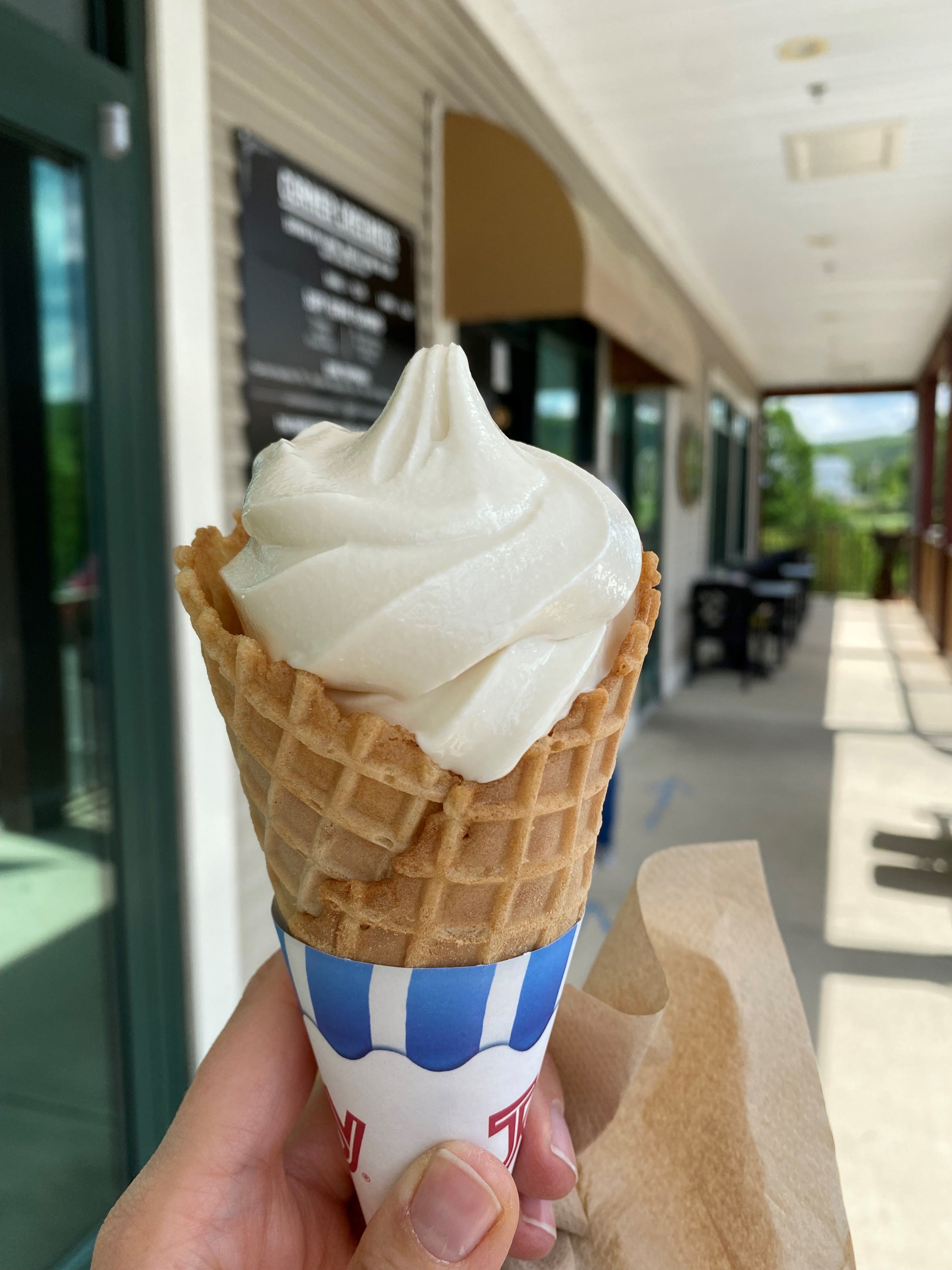 A cup of soft serve ice cream, known as a creemee