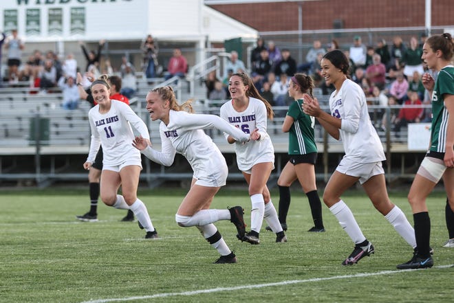 Bloomfield Hills' Drew Martin celebrates a goal during the Division 1 girls soccer regional semifinal against Lake Orion on Tuesday, June 7, 2022, at Novi.
