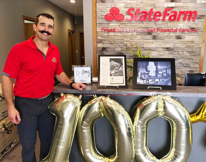 State Farm agent Greg Kurtenbach decorated his office recently for a celebration in Fairbury marking 100 years of State Farm insurance.