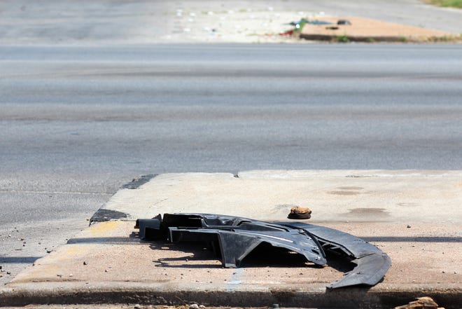 Vehicle debris was seen this week at three different locations at the Sayles Boulevard and South First Street intersection. Across from this pieces were broken pieces of plastic and across from that what looked to be a bumper. Clean up needed on Aisle 5!