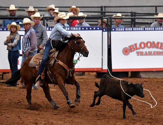 Abilene's Biloxi Shultz ropes a calf during breakaway roping Wednesday.