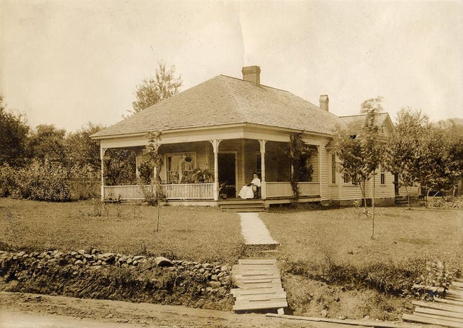 This photograph shows the home of Dr. Landis and Mrs. Landis, situated on what is now West State Street in Black Mountain.