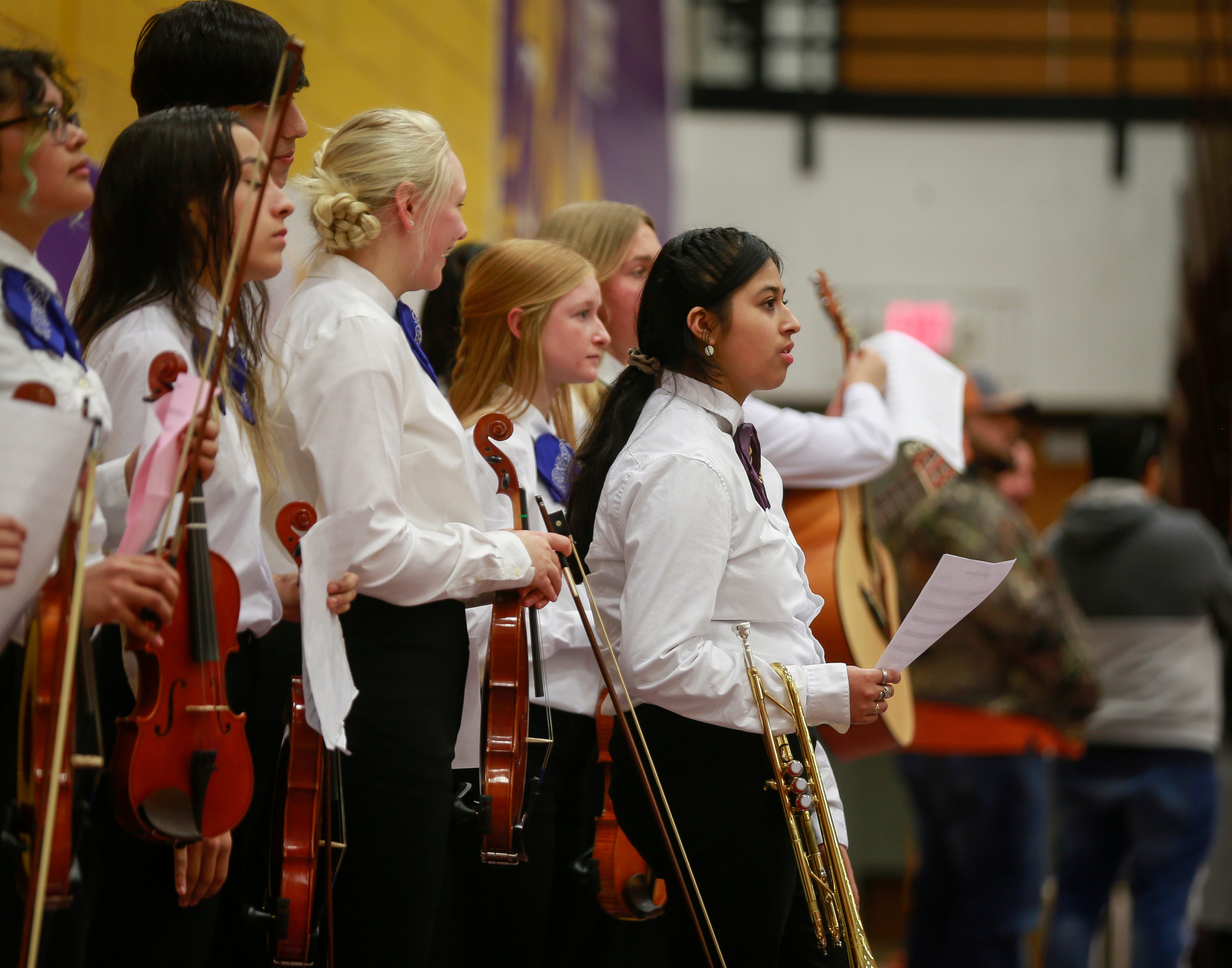Members of the Denison High School mariachi ensemble wait to perform during the 2022 Fiesta Mariachi.