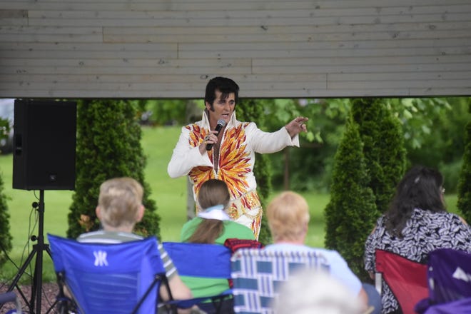 Elvis entertained more than 200 visitors Wednesday evening during the Marvin Memorial Library's kickoff to adult summer reading in Shelby.