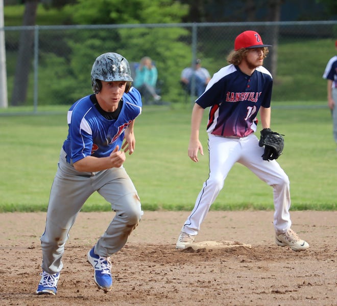 Cambridge's Rylee Wilson (42) takes off for third base  during Thursday's American Legion match-up with Zanesville at Don Coss Stadium.