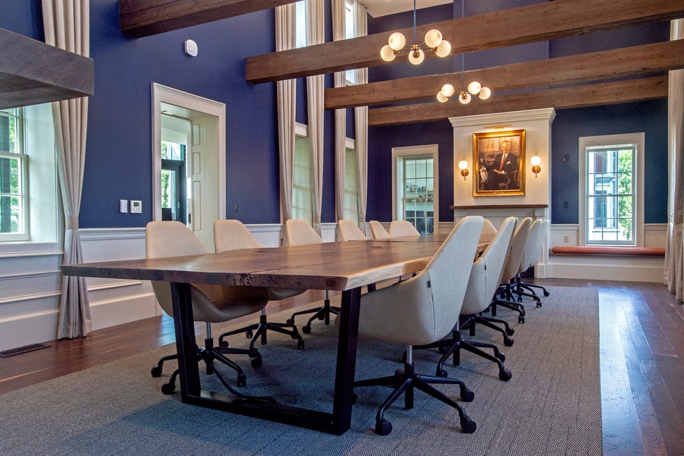 The Federal House conference room is shown, on June 6, 2022. The Federal House, at the eastern end of the Penn State Behrend campus in Harborcreek Township,  is undergoing a multi-million expansion and improvement. A portrait of Tom Hagen benefactor of the project and chairman of Erie Inurance, hangs in the background.