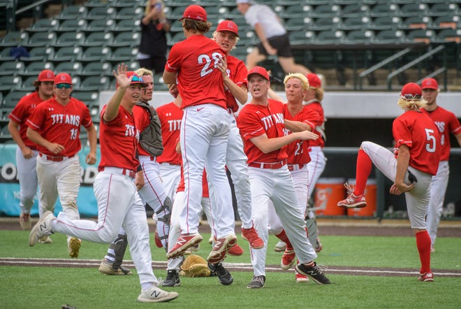 The Chatham Glenwood Titans celebrate after defeating the Washington Panthers 2-1 in the Class 3A state baseball semifinals Friday, June 10, 2022 at Duly Health & Care Field in Joliet.