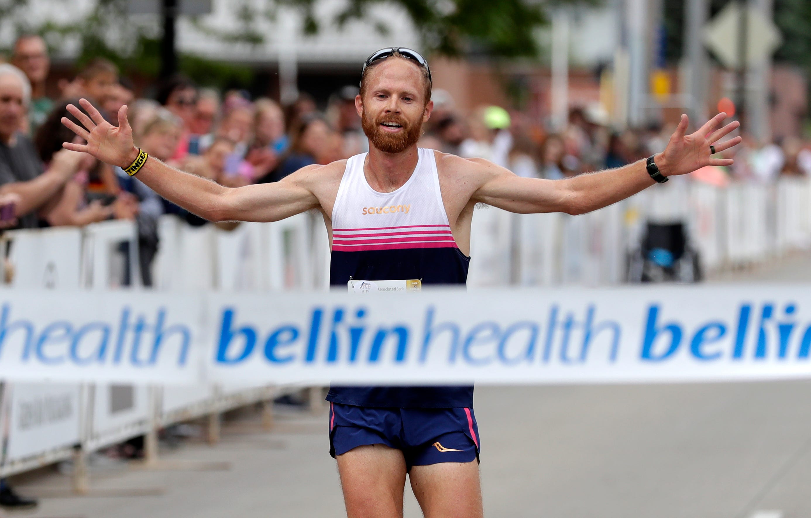 Jared Ward, Risper Gesabwa repeat as Bellin Run 10K champions