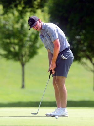 Blake Hartford puts on the back nine during the first round of the 45th annual  Zanesville District Golf Association Amateur on Saturday at Cambridge Country Club. Hartford shot 3-under-par 69 to take a one-shot lead entering Sunday's second round at Zanesville Jaycees.