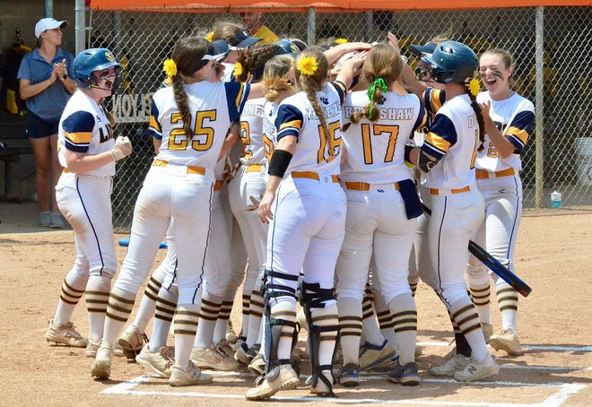 South Lyon celebrates a home run during the Division 1 softball regional final against Dexter on Saturday, June 11, 2022, at Northville.