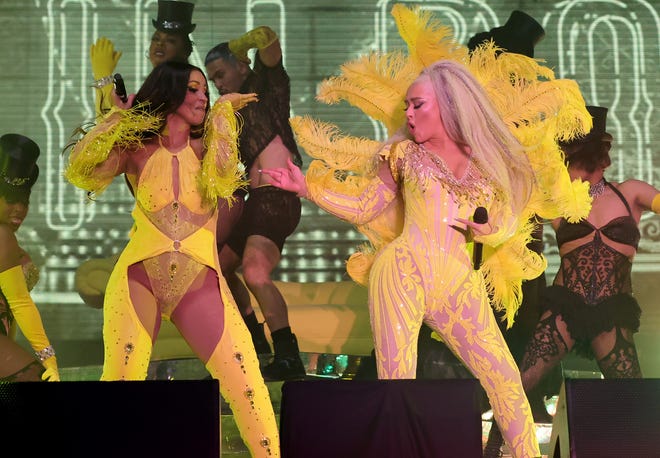 Mya and Christina Aguilera Reunite to Sing Their 2001 Song "Lady Marmalade," amid wild cheers from the crowd.