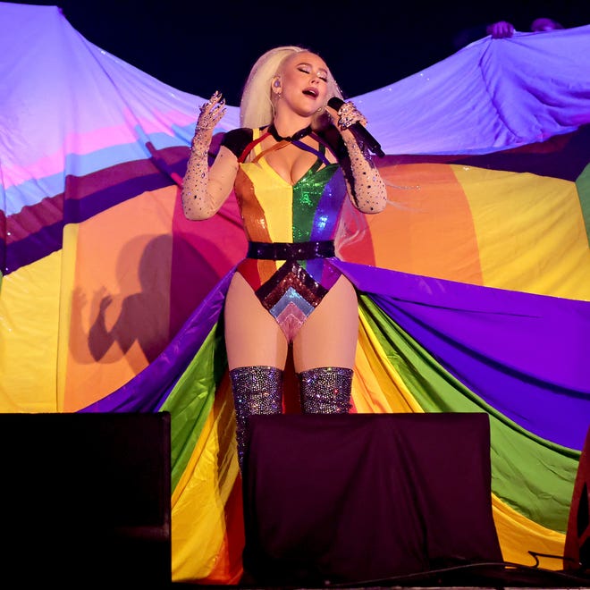 For her ballad "Beautiful," Aguilera donned a flowing cape resembling the Pride flag. The cape was so large that her back-up dancers had to hold it up for her.