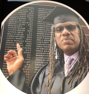 New Bern native Byron Moore graduated from Hardin-Simmons University in Abilene, Texas, 32 years after his last basketball game with the university.