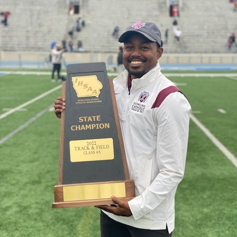 Dowling Catholic's Jarred Herring was named the Register's Coach of the Year in boys track for 2022 after leading the Maroons to the 4A state championship.