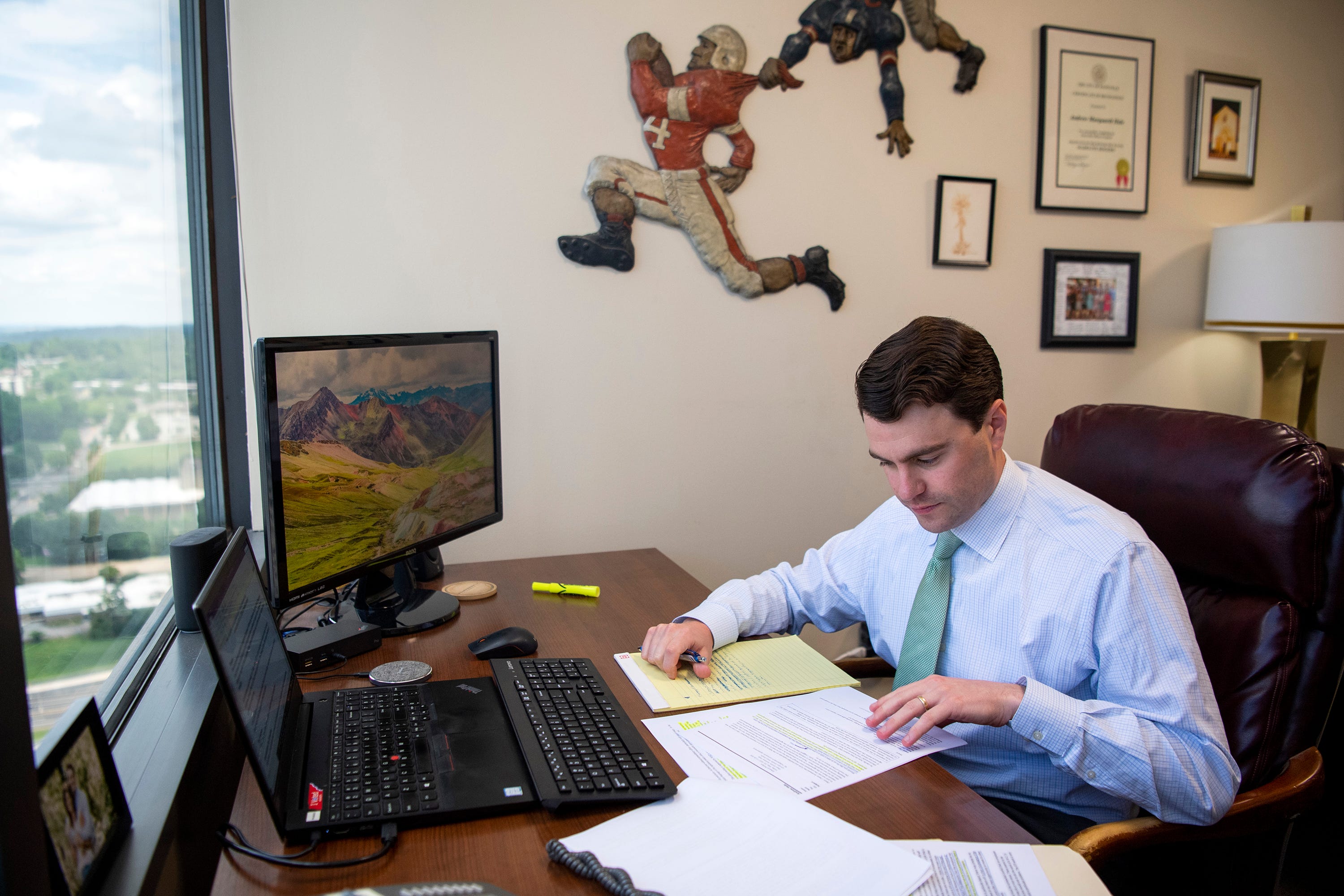 Attorney Andrew Hale works at his desk at Kramer Rayson's downtown Knoxville office on Friday, June 3, 2022.