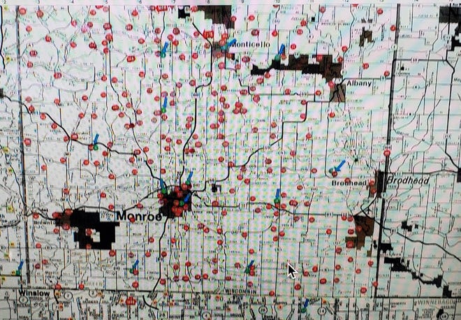 Red dots on the map of Green County represent the locations of cheese factories that once produced cheese long ago.