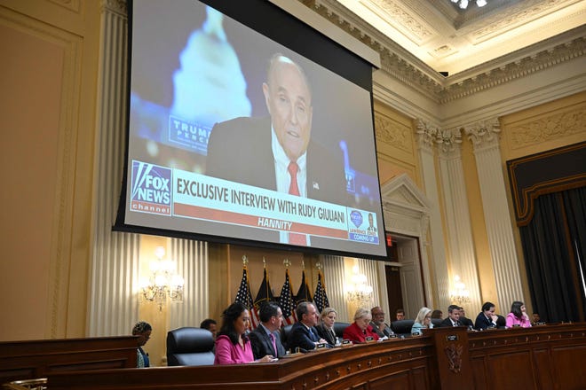 Former Trump campaign lawyer Rudy Giuliani is seen on a screen during a hearing by the Select Committee to Investigate the Jan. 6, 2021, attack on the US Capitol on June 13, 2022, in Washington.