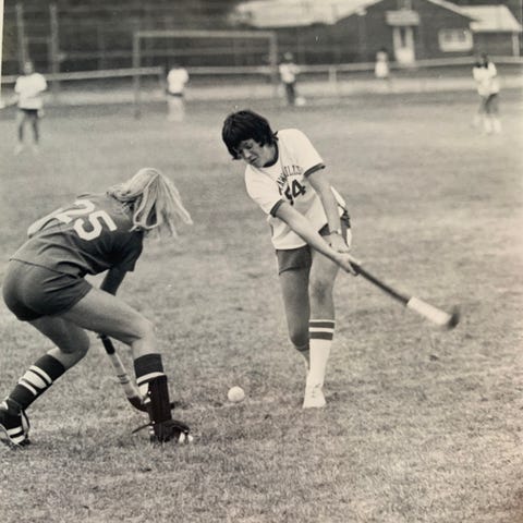 Christine Brennan, right, played six sports in hig