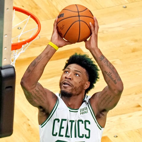 Marcus Smart dunks the ball during Game 4 against 