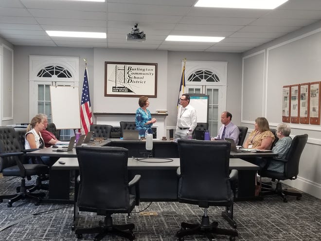 The Burlington School Board vice president Deborah Hatteberg addresses outgoing superintendent Pat Coen towards the end of the school board meeting on Monday, June 14, 2022.