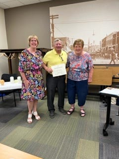John Swan, center, is the recipient of the Geneseo Chapter DAR National Community Service Award. He is photographed with Ann Helller, left, Regent, Geneseo Chapter DAR; and Cheryl Chamberlain, Community Service Chairman.