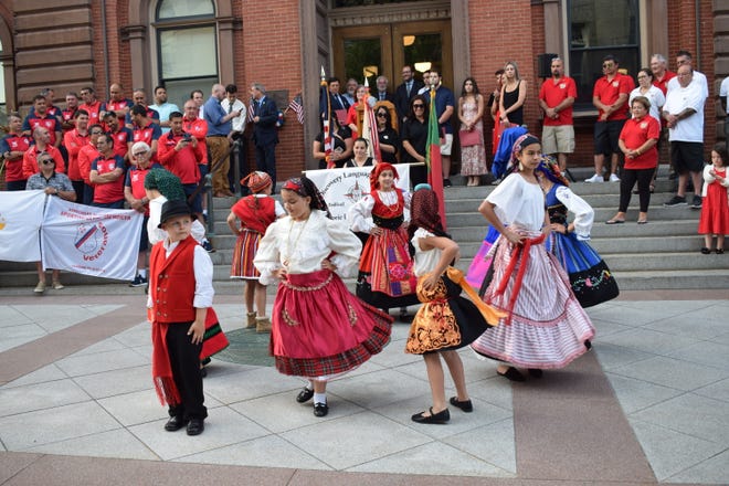 The Discovery Language Academy Folklore Group performs for the Portuguese Education Minister at the Day of Portugal celebration in front of New Bedford City Hall.