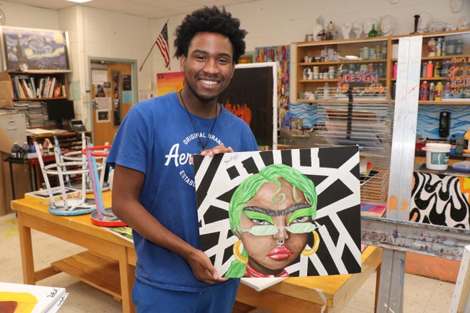 Newburgh Free Academy senior Bryce Knight shows some of his work.