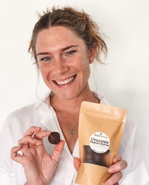 Jessica Tharp is the owner of Melted Honey, a new healthy food concept in Bay County that provides flavors of nourish balls with homemade ingredients.  Tharp is shown holding the chocolate peanut butter balls.