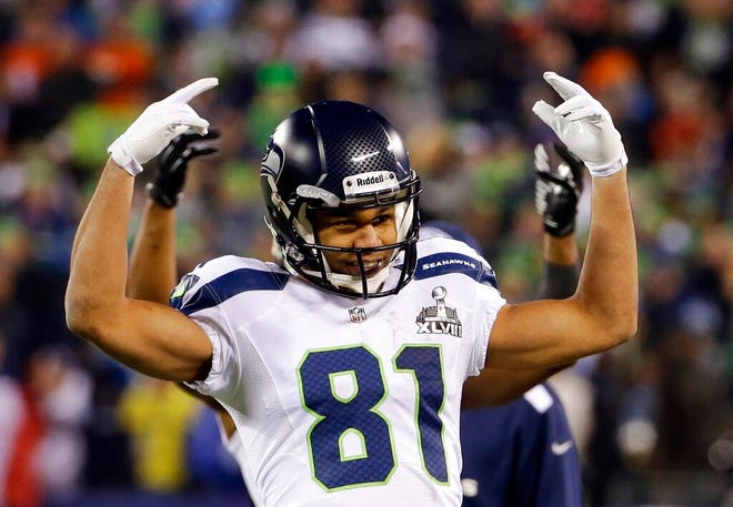 Seattle Seahawks' Golden Tate celebrates during the first half of the Seahawks' 2014 Super Bowl win. The former receiver is back in the Pacific Northwest — but this time on a baseball diamond with the former Kitsap BlueJackets semi-pro team.