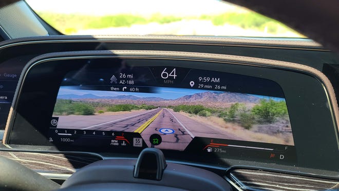 The instrument cluster in the 2023 Cadillac Escalade-V offers multiple views -- including a full camera for Augmented Reality Mode when navigating. The screen shows you where to turn on the road.