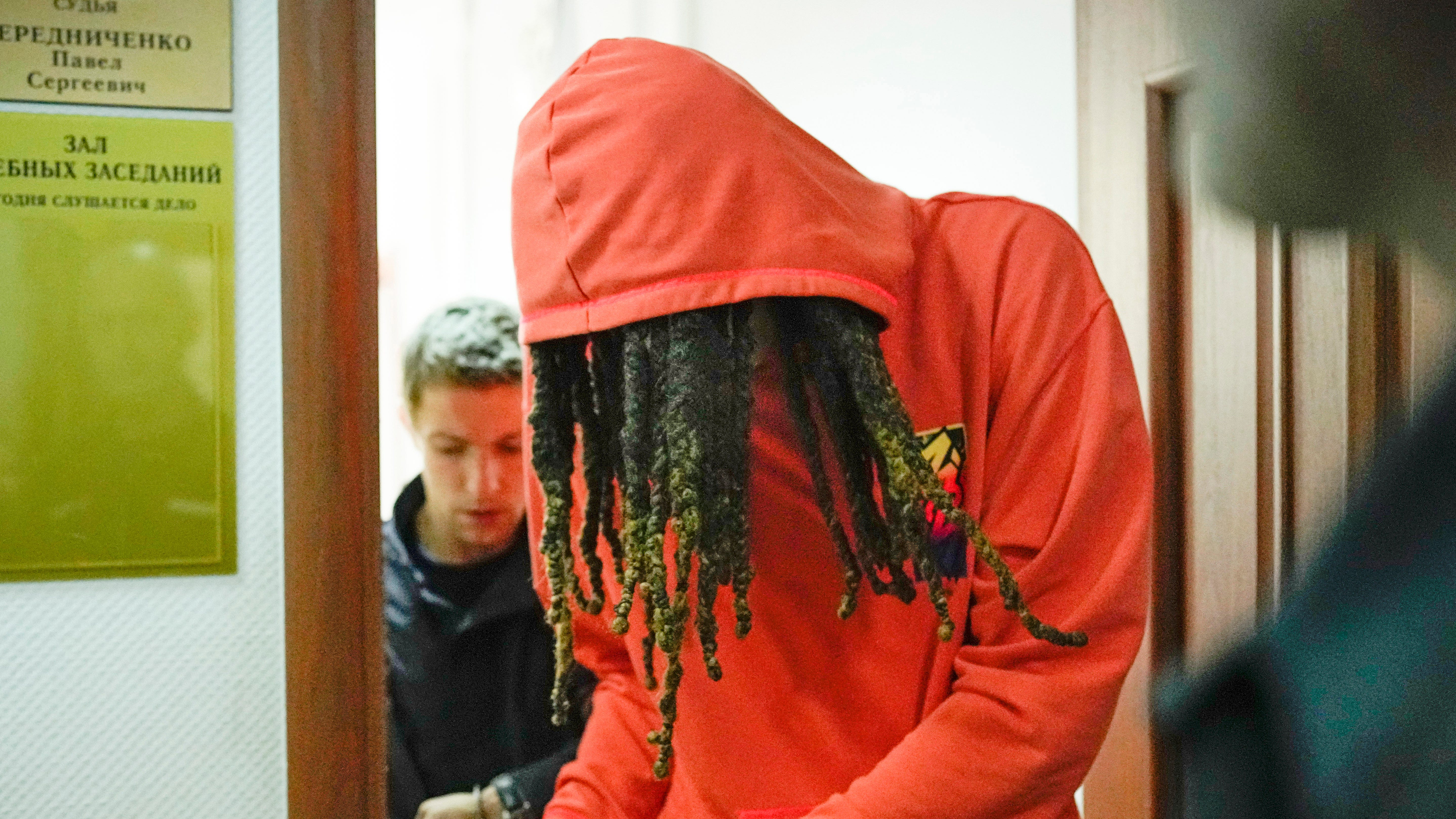 Brittney Griner leaves a courtroom after a hearing, in Khimki just outside Moscow, May 13, 2022.