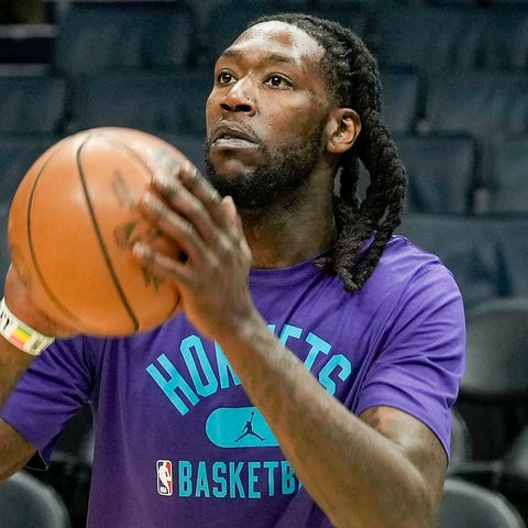 Hornets center Montrezl Harrell warms up before a 