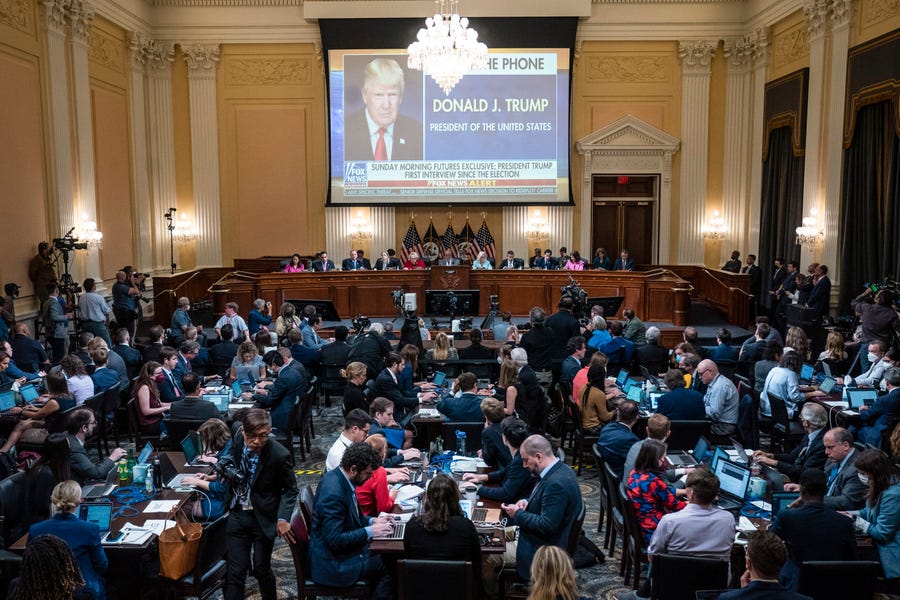 A video is played as an exhibit as the House select committee investigating the Jan. 6 attack on the U.S. Capitol continues to reveal its findings of a year-long investigation, at the Capitol in Washington, Monday, June 13, 2022.
