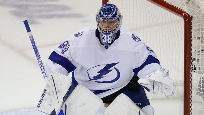 Tampa Bay Lightning goaltender Andrei Vasilevskiy (88) defends the goal against the New York Rangers during the first periodin Game 5 of the NHL Hockey Stanley Cup playoffs Eastern Conference Finals, Thursday, June 9, 2022, in New York (AP Photo/Adam Hunger)
