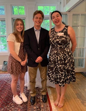 The Portsmouth Women’s City Club awarded scholarships of $1000 to two Portsmouth High School seniors. From left to right are Hannah Westlake, Michael Schoff and Scholarship Chairperson Stephanie Harzewski.