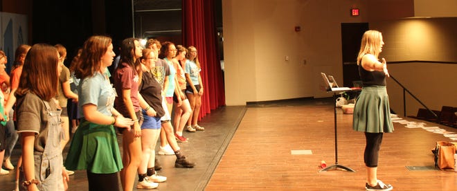 Led by Alyssa Serfling, at right, students rehearse during 4-H Performing Arts Camp in the Johnson Fine Arts Center on the campus of Northern State University Wednesday morning. Performances will be Friday at 7 p.m. and Saturday at 10 a.m. at the Johnson Fine Arts Center. They are dedicated to sisters Jayna and Kylee Sanborn of McPherson County, who died in a car crash in November 2019. Both sisters participated in the program. This year would have been Kylee Sanborn's senior year.