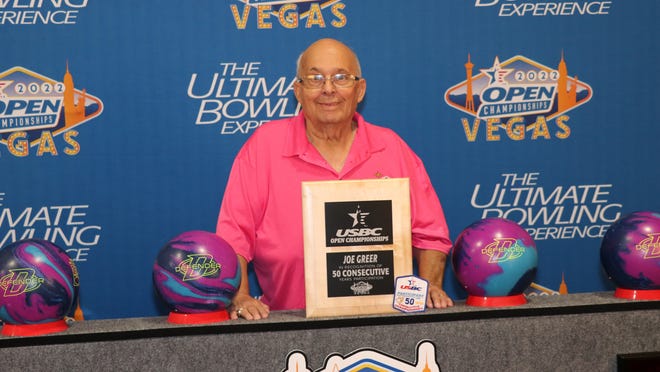 Muncie native Joe Greer poses for a picture with a plaque as he competes in his 50th United State Bowling Congress (USBC) Open Championships. Greer has attended the Open Championships every year since 1972.